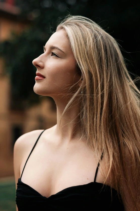 Woman's chest wearing a black bra